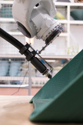 Kunststoffextruder auf Industrieroboterarm