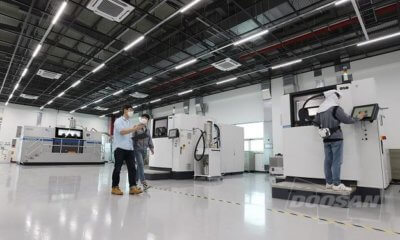 3D-Drucker und Mitarbeiter