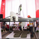 3D-Drucker und Mitarbeiter