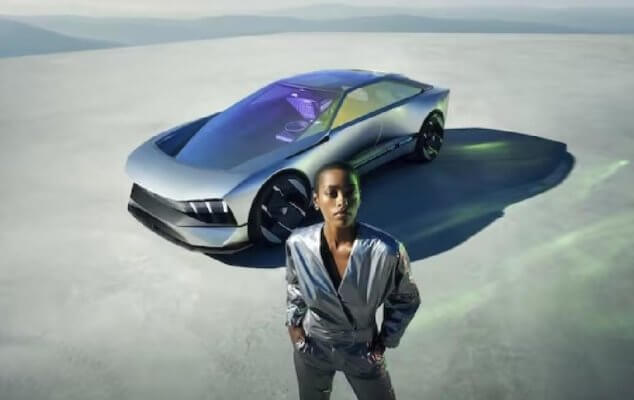 Peugeot Inception Konzeptauto mit Frau davor
