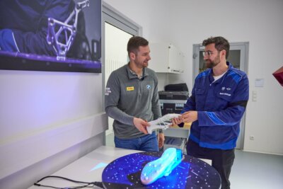 BMW Ingenieure mit 3D-gedruckten Spikeplatten für deutsches Bobteam