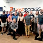 Jennifer Tegan, Managing Director von NY Ventures, und das PostProcess Team am Hauptsitz in Buffalo, NY