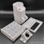 3D-gedruckte Gehäuseteile in Weiß für Elektronik und Industrieanwendungen von 3D Druck München