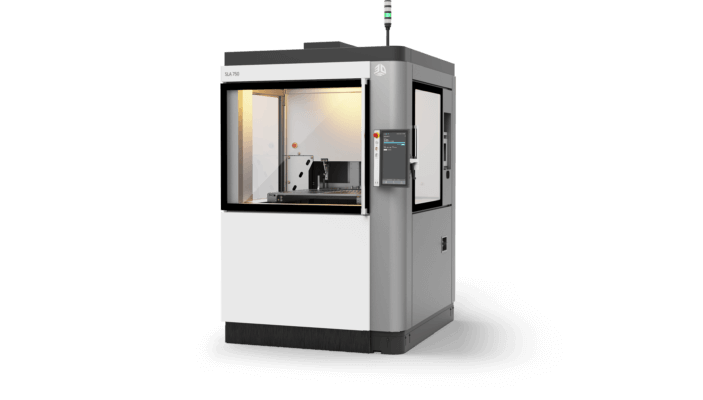 SLA 750 3D-Drucker von 3D Systems mit geschlossener Baukammer und Steuerungseinheit, geeignet für industrielle Anwendungen.