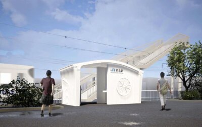 Rendering des ersten 3D-gedruckten Bahnhofs in Japan, Hatsushima-Station in Wakayama, mit modernem, weißem Betonbau und Fußgängerbrücke