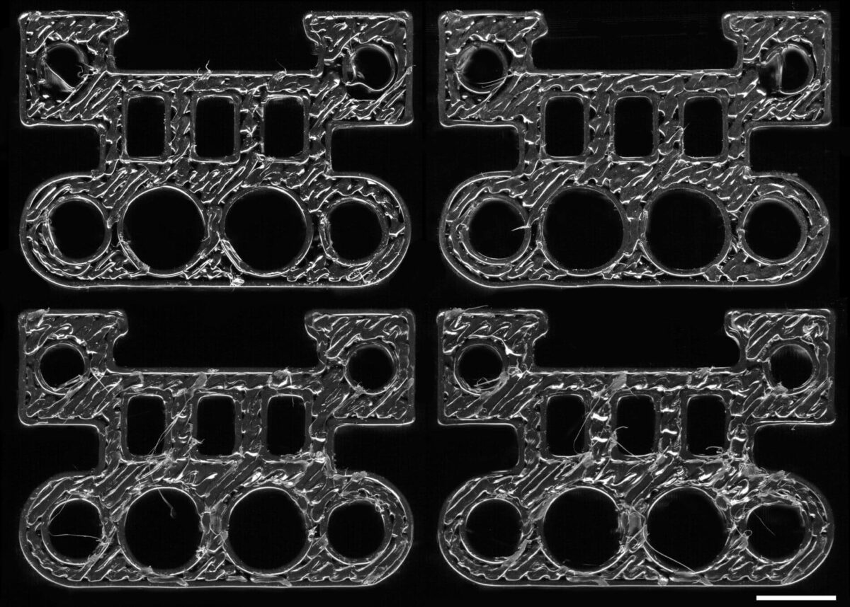 Vier 3D-gedruckte Kunststoffbauteile mit maschinenspezifischen Oberflächenstrukturen zur Rückverfolgung mittels KI-Modell