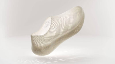 3D-gedruckter Adidas Climacool Slip-On Schuh mit luftdurchlässiger Gitterstruktur Seitliche Ansicht des 3D-gedruckten Adidas Climacool Slip-On mit durchgängiger Gitterstruktur zur Belüftung